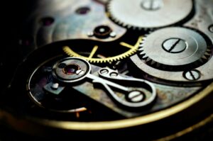 QVCT et organisation du travail : engrenages illustrant la coordination des actions internes