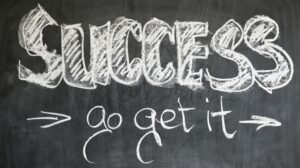 Inscription “Success, go get it” illustrant la montée en compétences des élus en formation SSCT